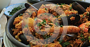 Spanish seafood paella: mussels, king prawns, langoustine, haddock