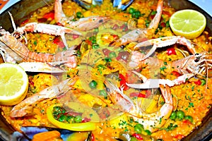 spanish seafood paella in a pan close up