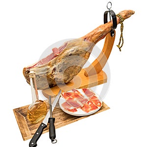 Spanish serrano ham on the leg with wood holder. photo