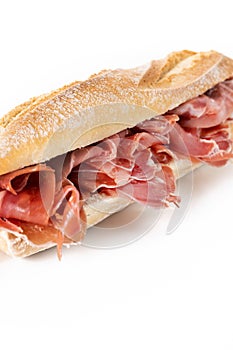 Spanish serrano ham sandwich isolated on white background