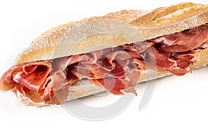 Spanish serrano ham sandwich isolated on white background