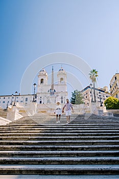 The Spanish Steps in Rome, Italy. The famous place is a great example of Roman Baroque Style. Italy couple on city trip