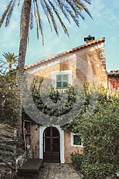 Spanish style house with plants and flowers located in Mallorca, Spain