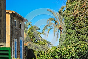 Spanish style house with plants and flowers located in Mallorca, Spain