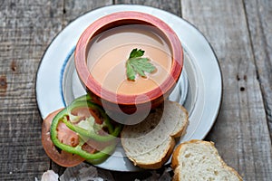 Spanish tomato gazpacho soup with garlic, bread and green pepper