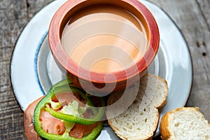 Spanish tomato gazpacho soup with garlic, bread and green pepper