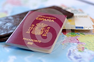 Spanish travel passport on the wallet with euro cash