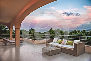 Spanish veranda and sofa with wine
