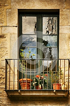 Spanish Windows with Balcony, Decorated With Fresh Flowers, Vintage Style