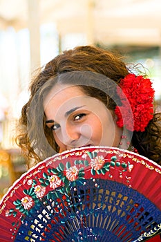 Spanish Woman with Red and Blue Fan photo