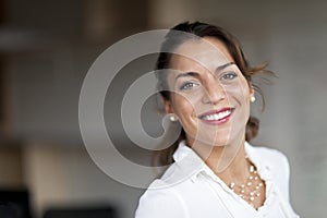 Spanish Woman Smiling At The Camera