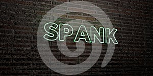 SPANK -Realistic Neon Sign on Brick Wall background - 3D rendered royalty free stock image photo