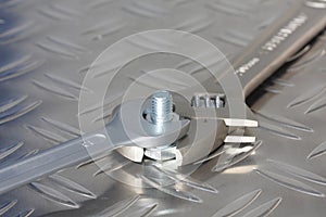 Spanner, bolt and nut