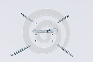 Spanner and confirmatory screeds, as concept of fasteners and work on the assembly of furniture at home