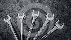Spanners on concrete background, Wrench tools