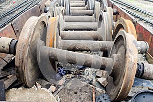 Spare parts of old train wheel on a track