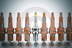 Spare parts spark plugs on white background for car and motorcycle