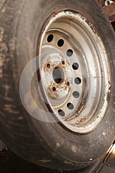 A spare tire, along with its rim, kept for an extended period