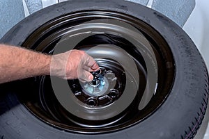 Spare tire in the trunk of a car