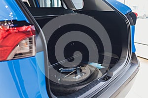 Spare tire in the trunk of a modern car.