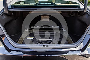 Spare wheel in the trunk of a modern car.