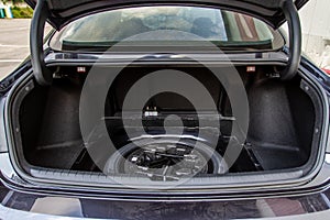 Spare wheel in the trunk of a modern car.