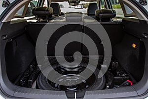 Spare wheel in the trunk of a modern car.