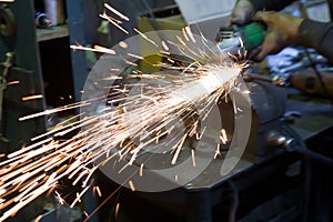 Spark metal from an electric grinder