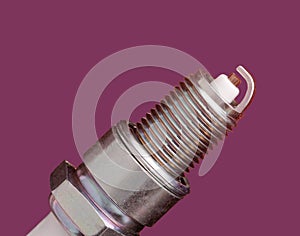 spark plug on red background