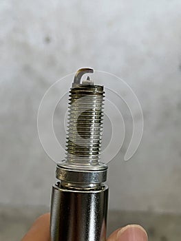 Spark plugs for optimal engine performance and efficient combustion in automotive maintenance