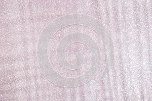 Sparking and glittering on the pink water surface with lines, abstract nature background