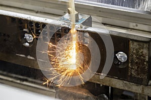 The sparking light from wire-EDM machine.