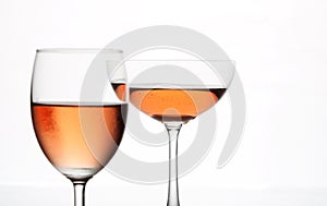 The sparking rose wine in the wine glass couple set