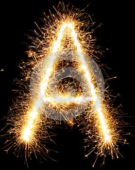 Sparkler firework light alphabet A on black