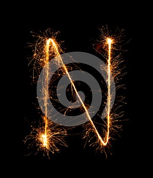 Sparkler firework light alphabet N (Capital Letters) at night