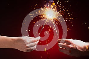 Sparklers in hands