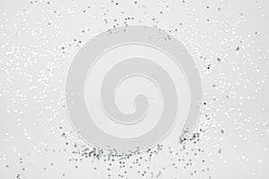 Sparkles silver stars on white background with text place- Image