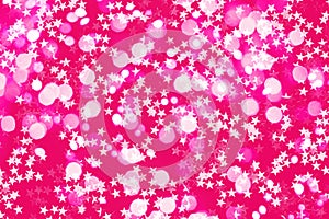 Sparkles and stars of pink glitter background. photo