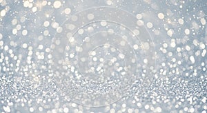 A sparkling, abstract background featuring soft-focus bokeh lights. The image is