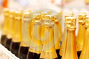 Sparkling champagne, bottles with a gold label