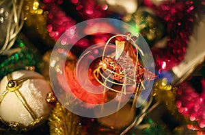 Sparkling christmas tree decorations  with tinsels and bokeh