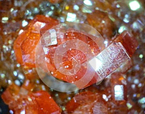 Sparkling cog like crystals of vanadinite