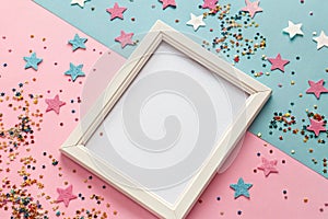 Sparkling confetti and frame for text on colored background