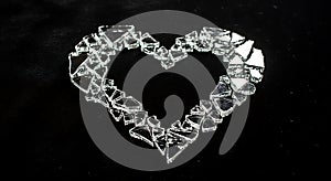 Sparkling crystal heart shape made of diamonds on black background