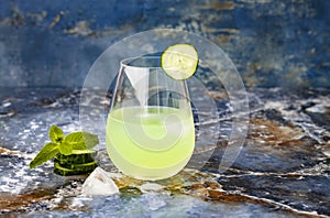 Sparkling cucumber mint gin and tonic fizz with aloe vera on marble table. Copy space. photo