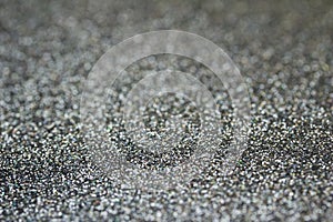 Sparkling defocused silver glitter bokeh abstract texture