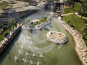 Sparkling Fountains and Lush Greenery Rejuvenate a Cityscape