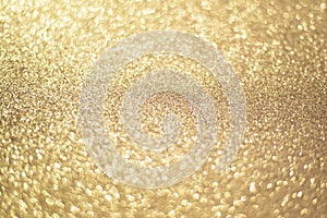 Sparkling gold bokeh background, gold color. Gold sequins background