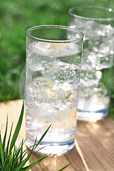Sparkling mineral water with icecubes photo