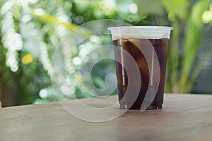 Sparkling Nitro Cold Brew Coffee in take away cup.